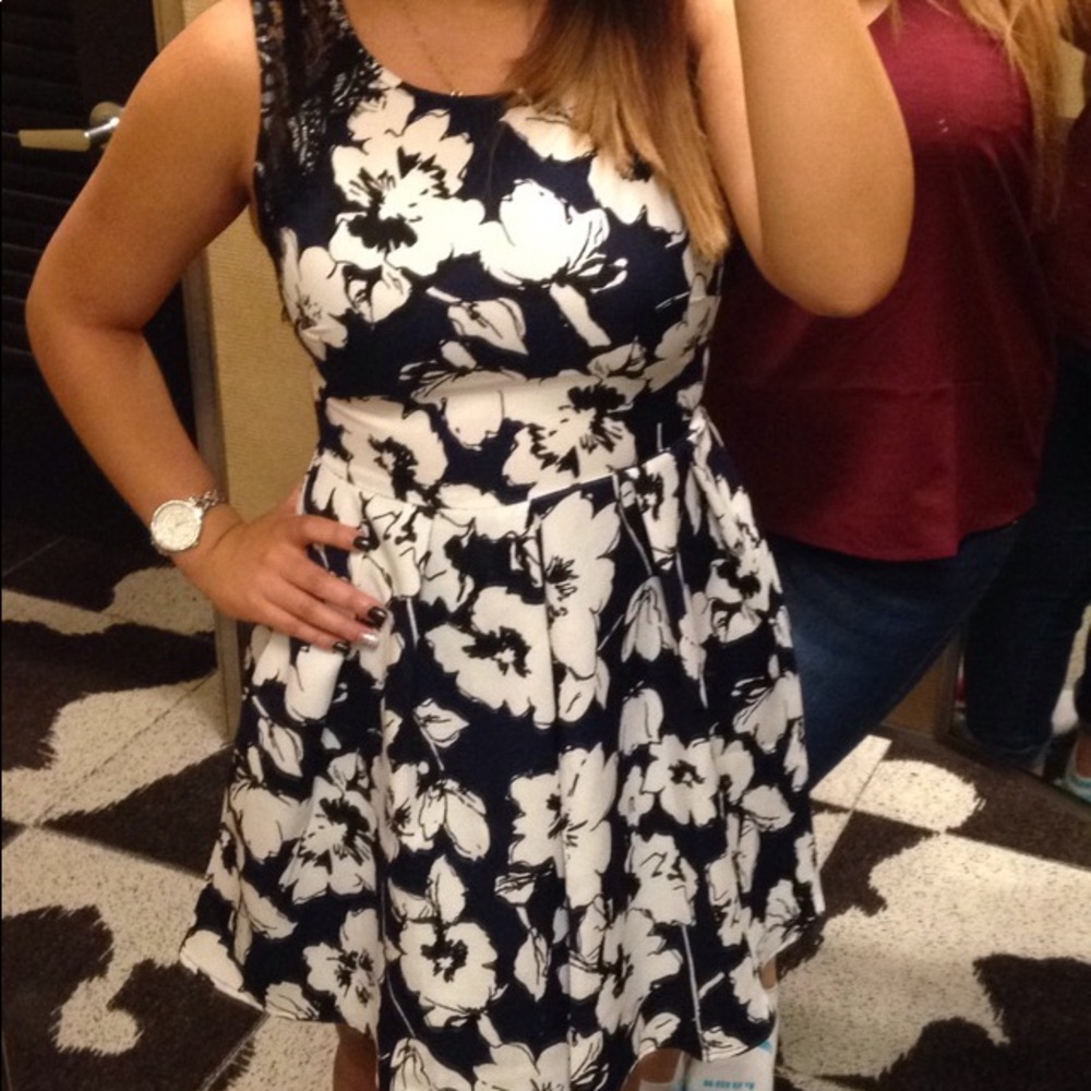 LUSH size small floral dress. Black lace trim.
